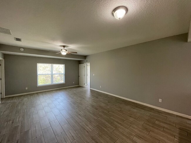 Photo - Modern 3-Bedroom Home with Office & Spacious Yard in Deltona Lakes!