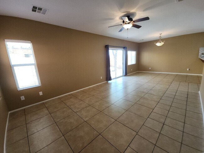 Photo - Beautiful detached home with fully fenced back yard.