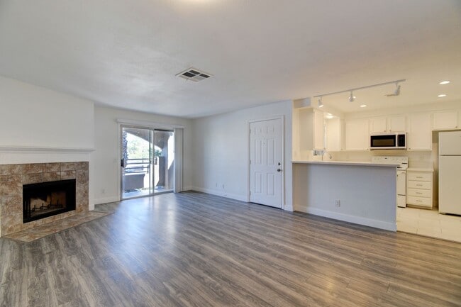 Building Photo - Renovated 2BR/2BA Condo w/ Fireplace, Balcony & In-Unit Laundry — Sunset Bay