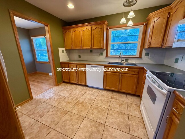 Photo - Charming 3 Bedroom Home with Finished Lower Level, Fenced Yard & 1-Car Garage