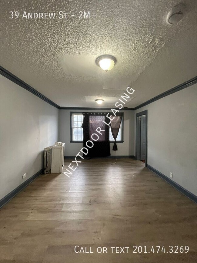 Building Photo - 39 Andrew St Unit 2M