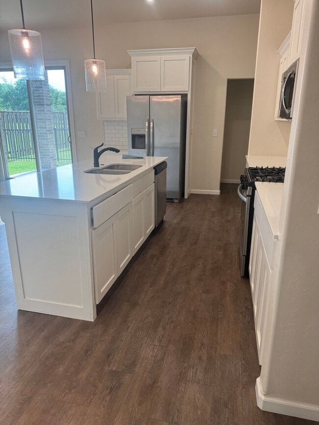 Photo - 4 bedroom, 2.5 bathroom, 2 car garage Gated Neighborhood