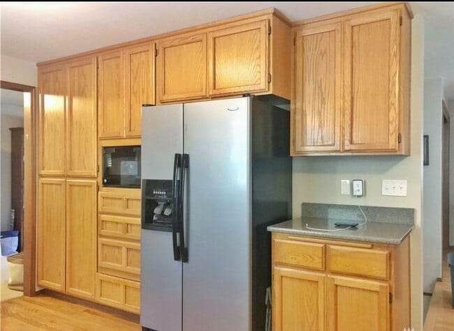 Photo - Open, bright and roomy with private backyard