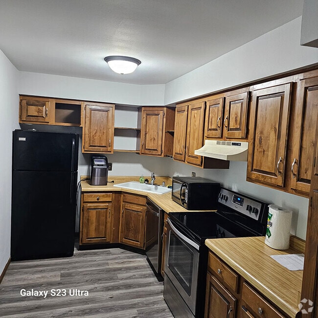 Building Photo - 1224 E Decorah Rd Unit #7 Rental