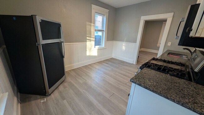 Photo - Come home to this great single family home with tons of charm and a beautiful yard