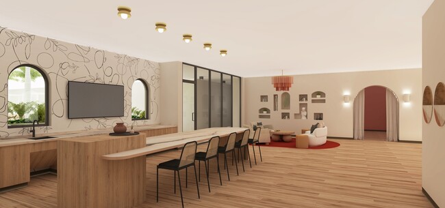 Unwind in the 6th floor resident lounge with a bar area. - Modera St. Petersburg Apartments