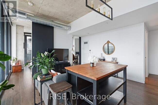 Photo - 21 Lawren Harris Square Unit 613