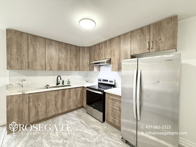 Photo - Spacious & Newly Renovated 4-Bedroom + Den... Unit 2