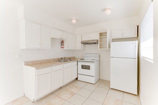 Photo - Bright & Spacious 2-Bedroom Upstairs Unit ...