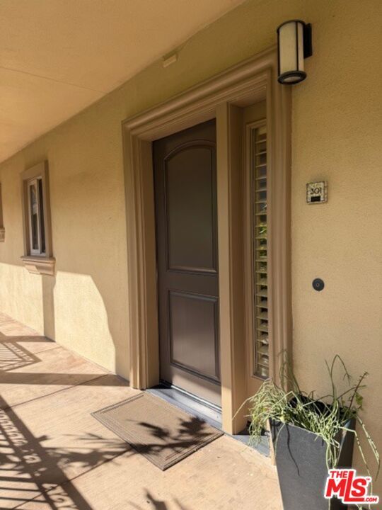 Building Photo - 8238 W Manchester Ave Unit 301