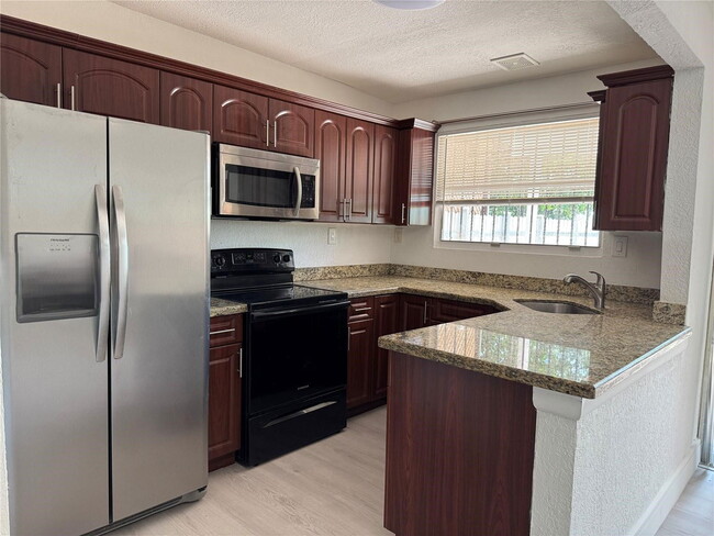 Photo - West 81st Place, Hialeah, FL 33014 - 4 BR 2.5 BA townhouse