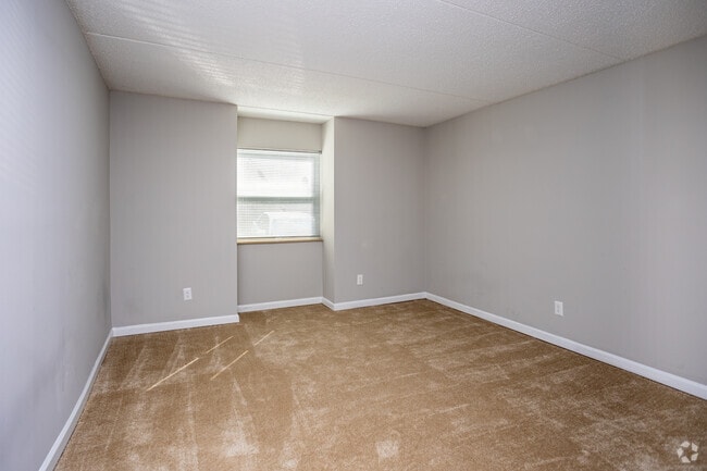 2BR, 1.5BA - 950SF - Primary Bedroom - Cedar Ridge Apartments