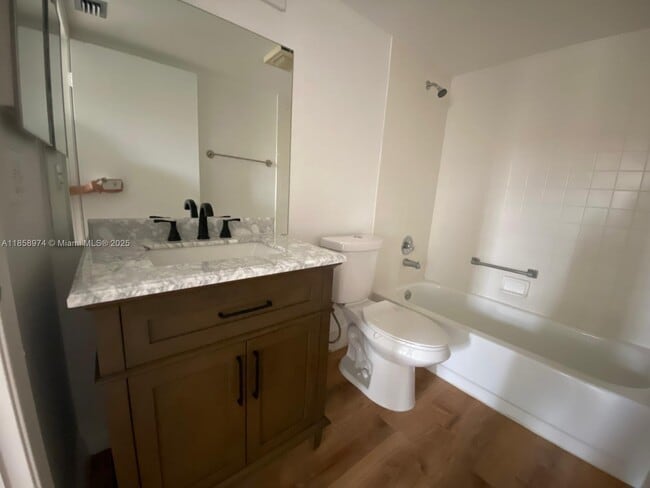Building Photo - 13000 SW 15th Ct Unit 404U Rental