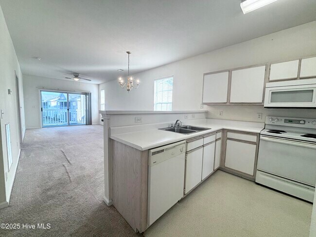Photo - 7509 Moorhen Ln SW Unit 52d