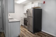Elevate your culinary adventures in The Gallery's modern kitchen, featuring sleek stainless steel appliances and ample storage space. Enjoy the perfect blend of style and functionality. Schedule your visit today to see it in person!