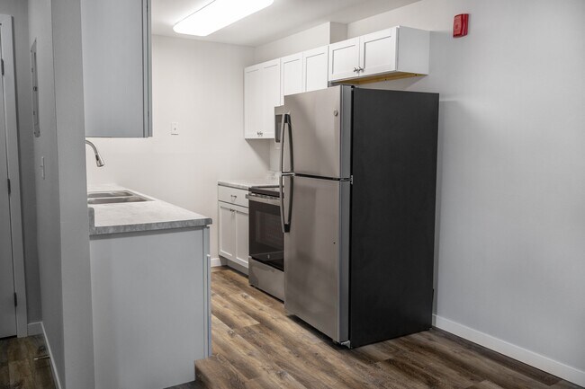 Elevate your culinary adventures in The Gallery's modern kitchen, featuring sleek stainless steel appliances and ample storage space. Enjoy the perfect blend of style and functionality. Schedule your visit today to see it in person!