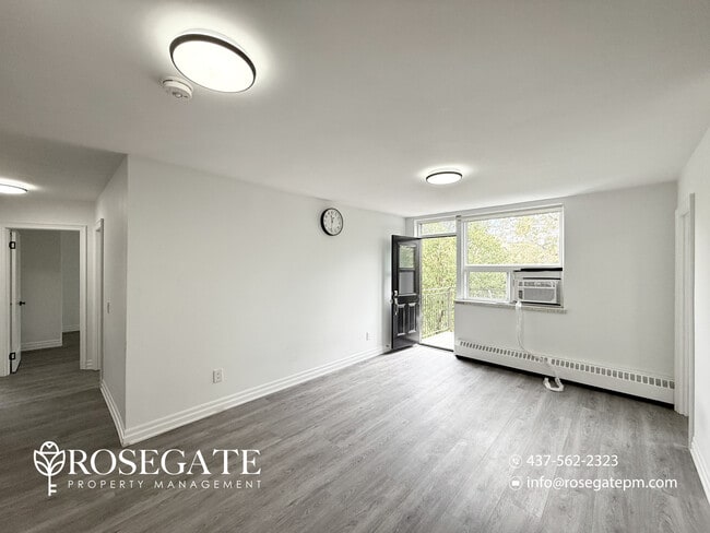 Photo - Spacious & Newly Renovated 4-Bedroom + Den... Unit 2