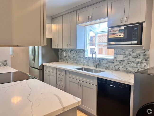 Building Photo - Completely Remodeled 4 Bedroom Home with C...