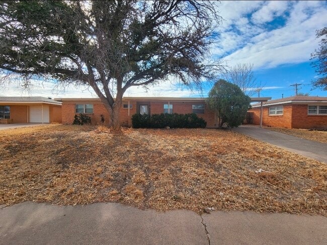 Building Photo - 3 bed 2 bath with 1 car carport