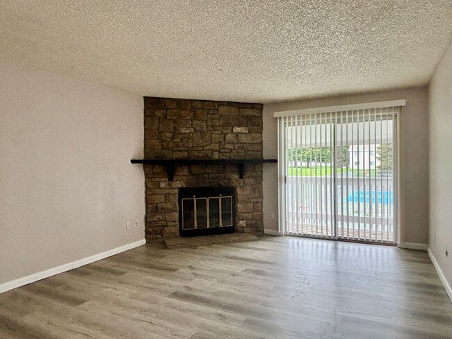 Photo - Updated 2 Bed/2 Bath Aurora Condo – Fireplace, Washer/Dryer, Community Perks!