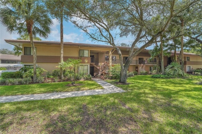 Building Photo - 9565 NW 2nd Pl Unit 1-H Rental