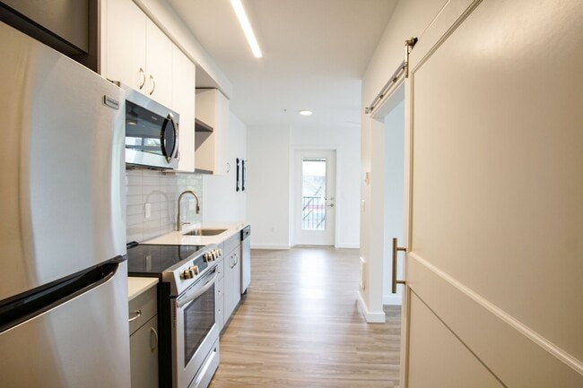 Building Photo - Stunning 1-Bedroom w W/D + Balcony Ready Mid-June! Unit 201