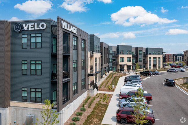 Building Exterior & Parking | Velo Village | Apartment in Franklin WI - Velo Village Rental