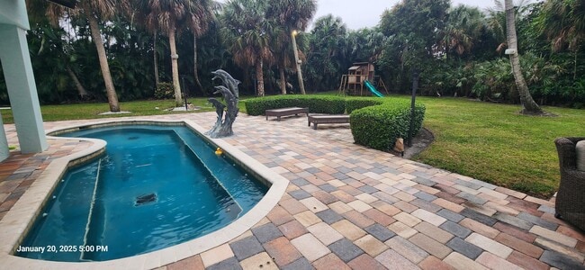 Building Photo - 1066 SE St Lucie Blvd