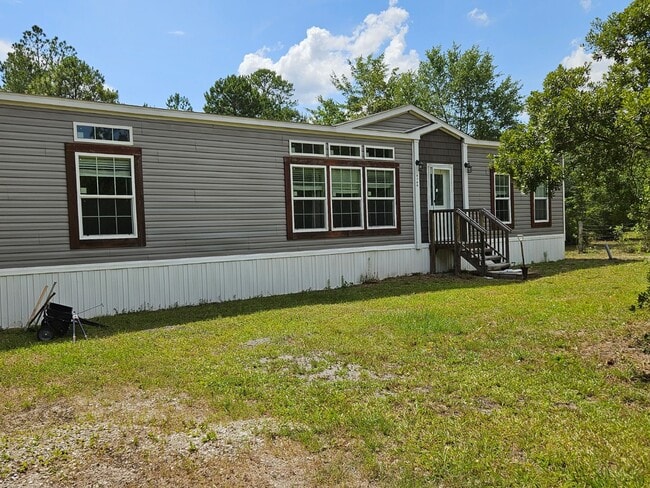 Building Photo - 4745 Firefly Palms Cv Rental