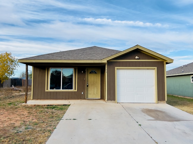 Building Photo - Cozy 3-Bedroom, 2-Bathroom Home with Garag...