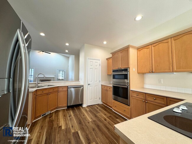 Photo - Beautiful 2-Bedroom Townhome with Vaulted Ceilings & 2-Car Garage!!