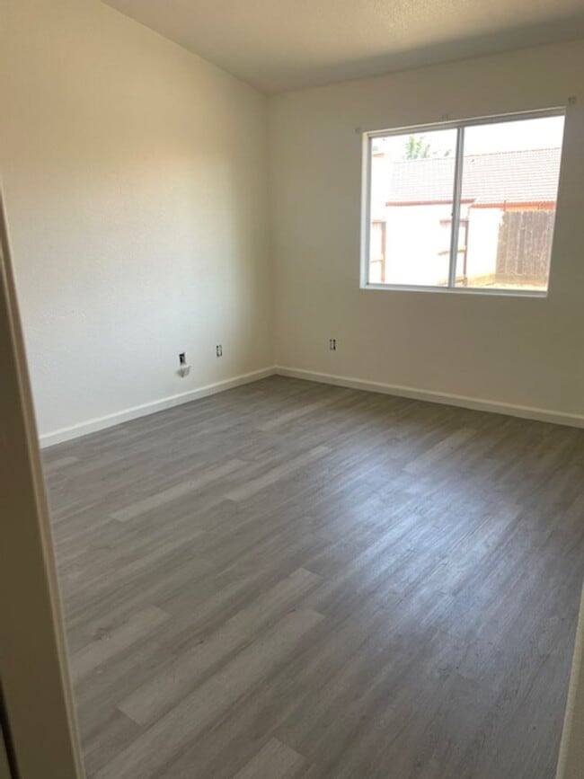 Photo - NEWLY INSTALLED FLOORING AND APPLIANCES