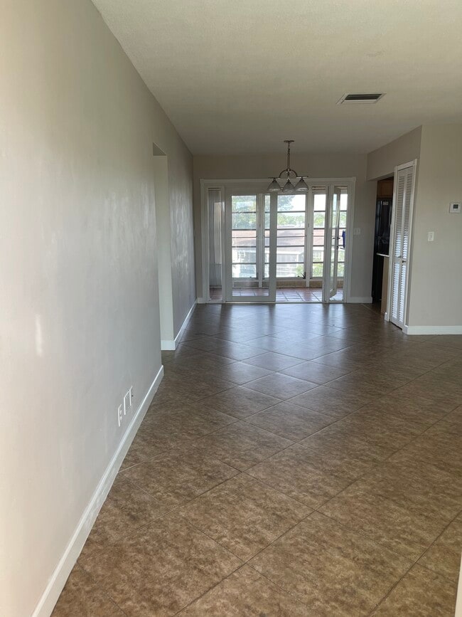 Dining Room to Patio - 941 Crystal Lake Dr Unit 312
