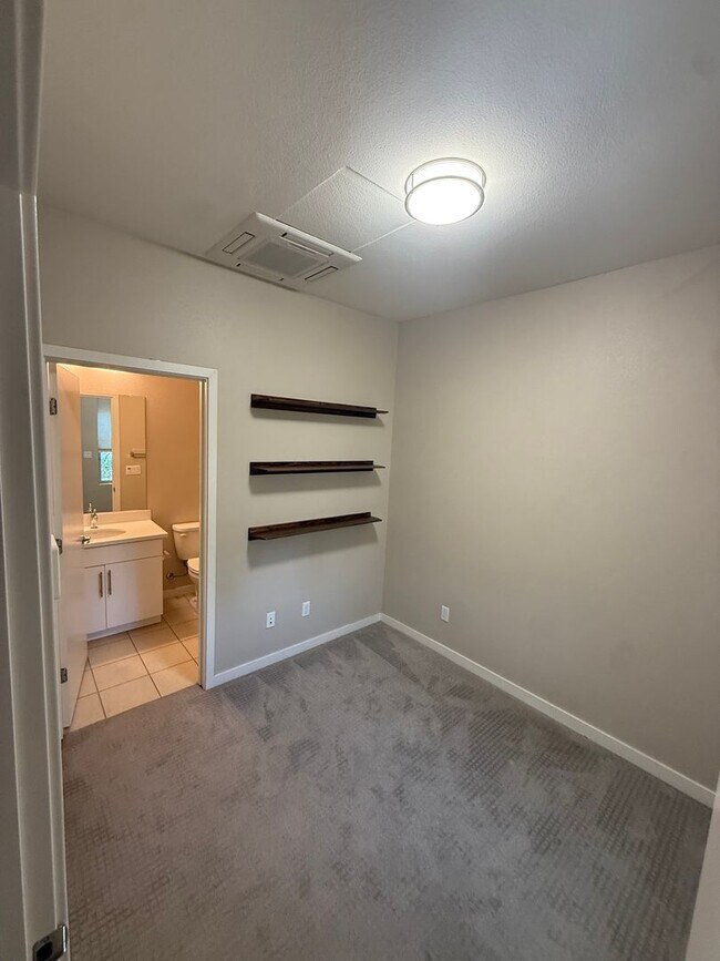 Photo - 2 bed | 2.5 bath | 1014 SF | 1 Car Garage | Tri-level condominium| Tenant pays $150 WS&G