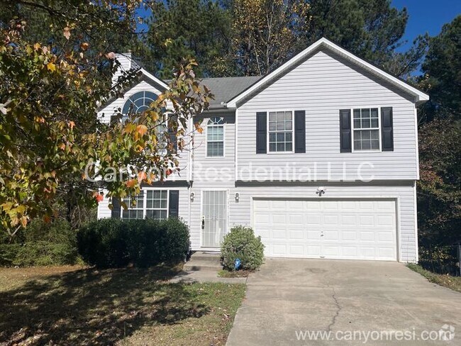 Building Photo - Fully renovated two story 4 bedrooms home