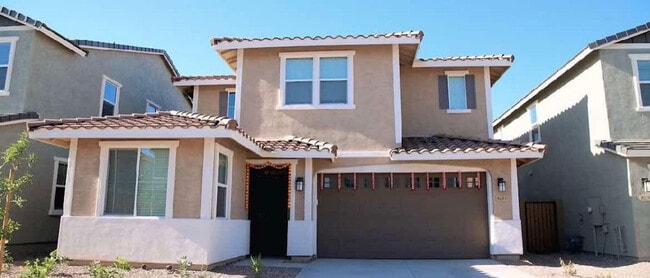 Building Photo - 8243 E Petunia Ave
