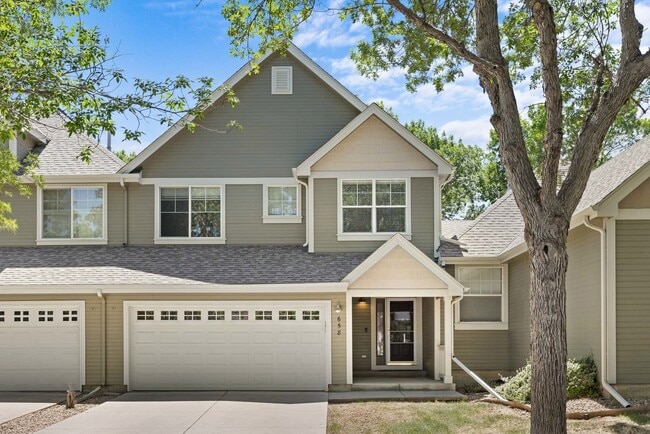 Building Photo - Stay Cool and Cozy in this Modern Townhome with 2-Car Garage and Great Open Space Access