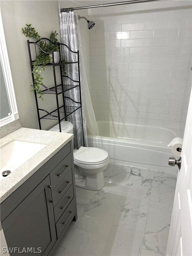 Photo - 3011 Sandpiper Bay Cir Unit C102