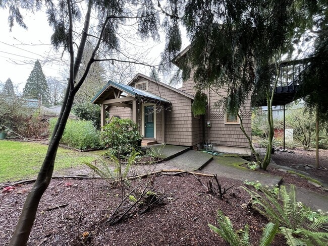 Photo - Vintage Urban Farmhouse 3 Bd 1 Bath home! Large bonus room & Balcony!  Surrounded by trees on lar...