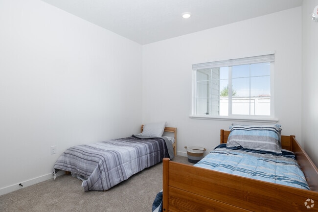2BD, 1.5BA - 1,060SF - Secondary Bedroom
