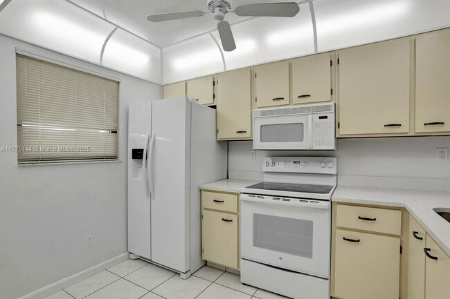 Building Photo - 9413 Boca Cove Cir Unit 119C Rental