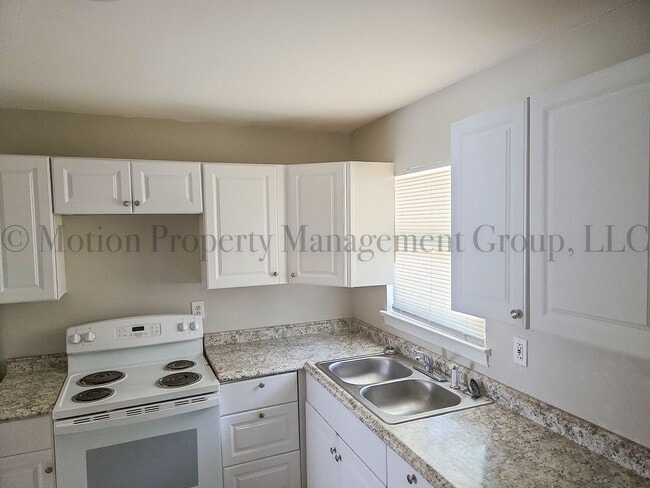 Building Photo - 1595 Carlisle St NW Unit 2