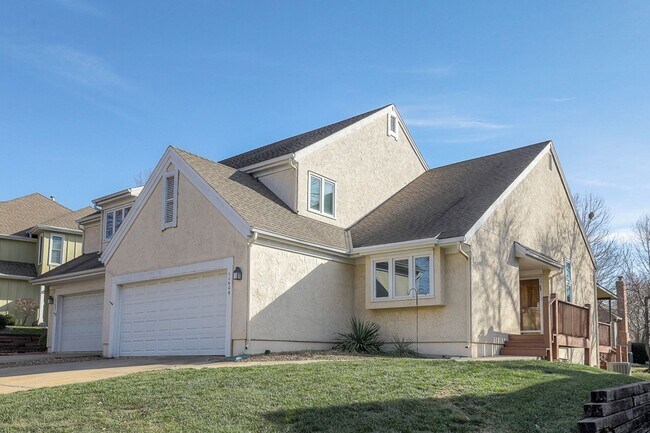 Photo - {11409} Updated Duplex in Fantastic Location + Two Car Garage + Main Level Master + Covered Deck