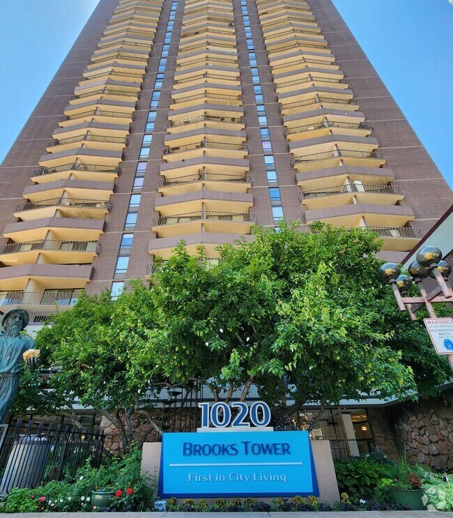 Building Photo - Affordable High Rise Condo in the heart of...