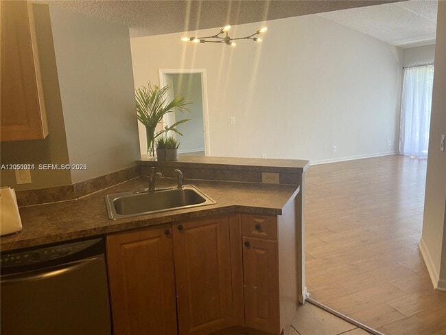 Photo - 8871 Wiles Rd Unit 301