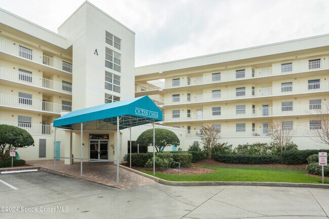 Building Photo - 8700 Ridgewood Ave Unit A204