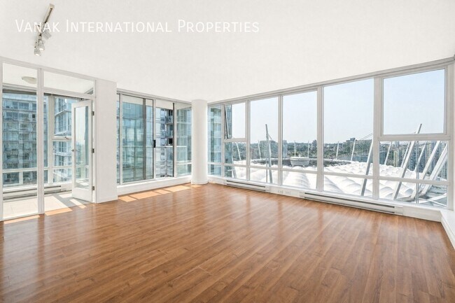 2 Bed + Den + Solarium | 2 Bath | Parking | Spectrum