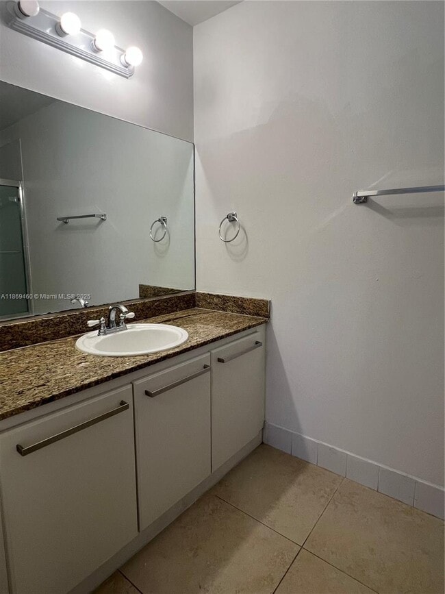 Building Photo - 4704 NW 114th Ave Unit 204-1