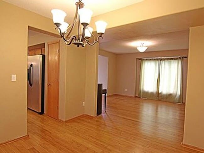 Photo - Great NE location -  4 bedroom 2.5 bath with attached 2 stall garage. Close to shopping & restaur...