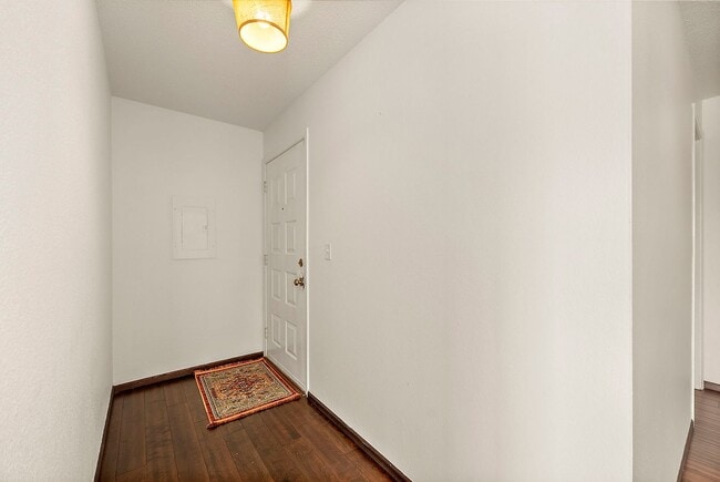 Photo - Top-Floor Condo with Panoramic Lake Easter Views, Vaulted Ceilings & Modern Updates!